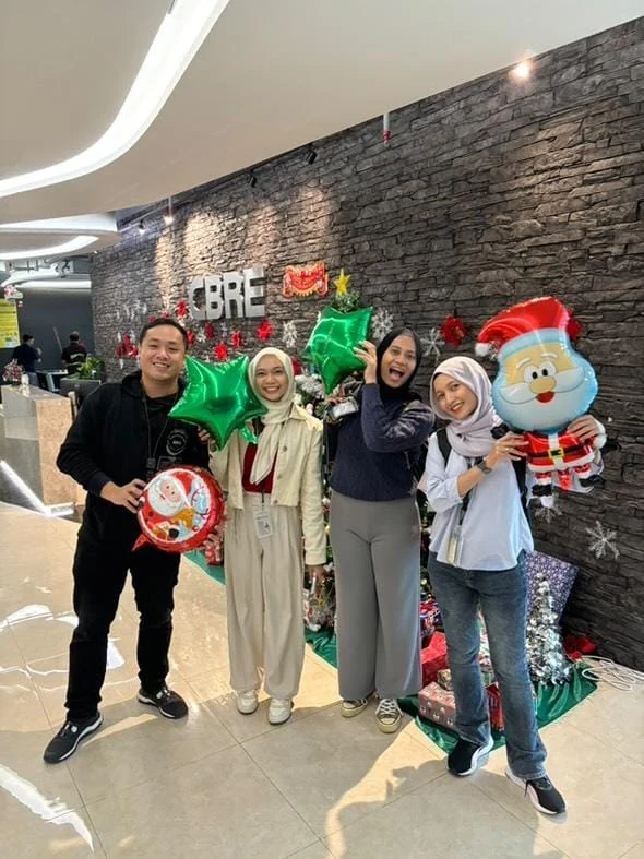 Adrian Chan with colleagues at CBRE
