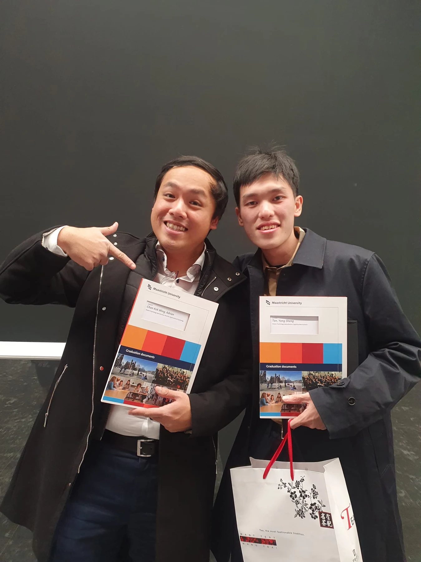 Adrian Chan celebrating graduation at Maastricht University
